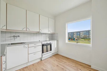 Familievenlig lejlighed med altan og parkering 1