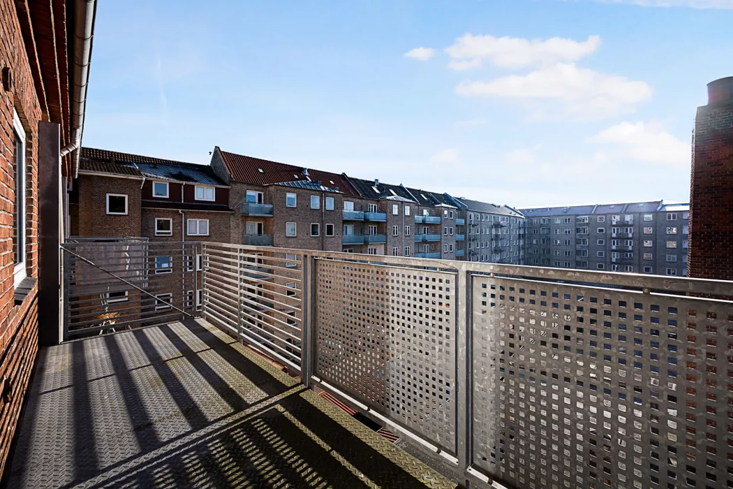 Delevenlig 3-værelses lejlighed med nyt køkken i Øgaden 10