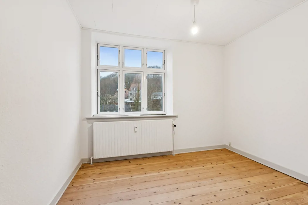 Rummelig 3-værelses lejlighed med fritliggende bjælker 7