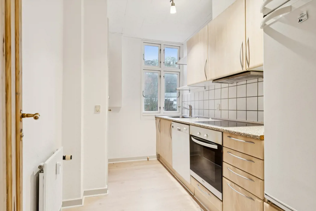 Rummelig 3-værelses lejlighed med fritliggende bjælker 2