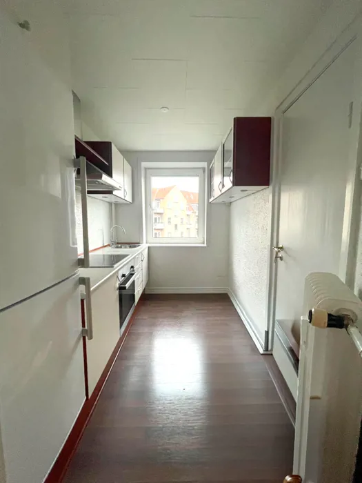 Charmerende 2-værelses lejlighed med altan 1