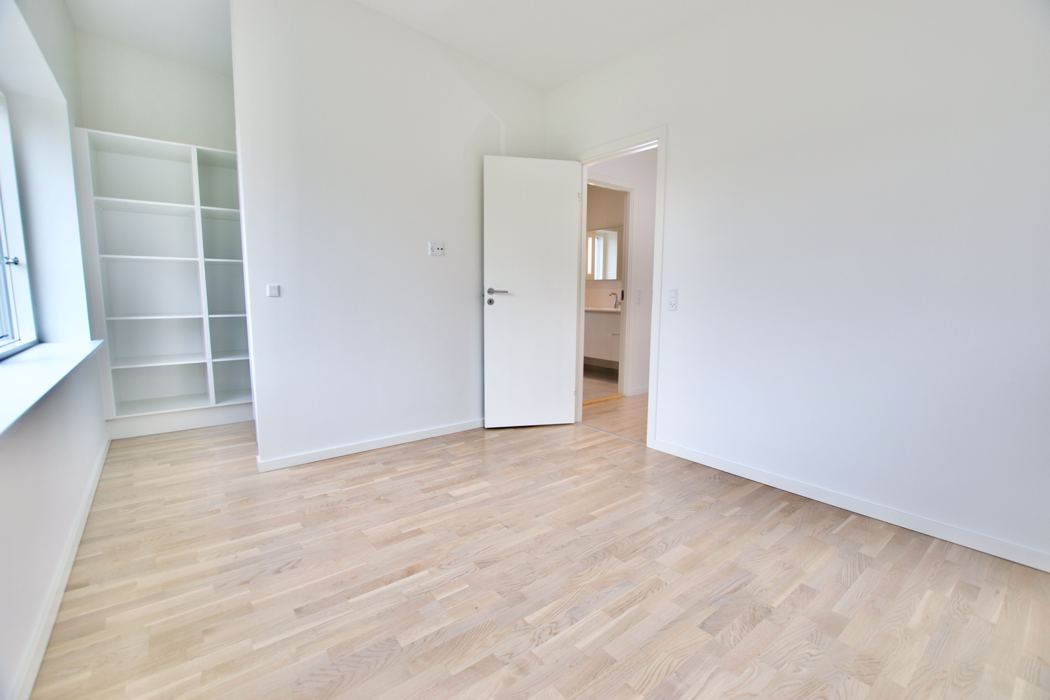 Fritliggende 4-værelses rækkehus på Marshalls Alle 6