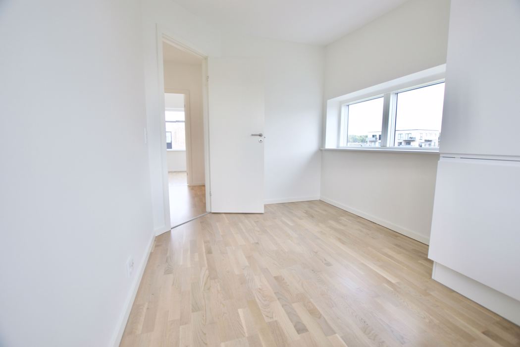 Fritliggende 4-værelses rækkehus på Marshalls Alle 8