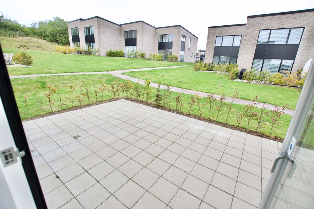 Fritliggende 4-værelses rækkehus på Marshalls Alle 14