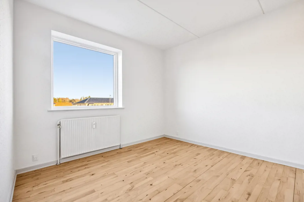 Lys 3-værelses lejlighed med altan 13