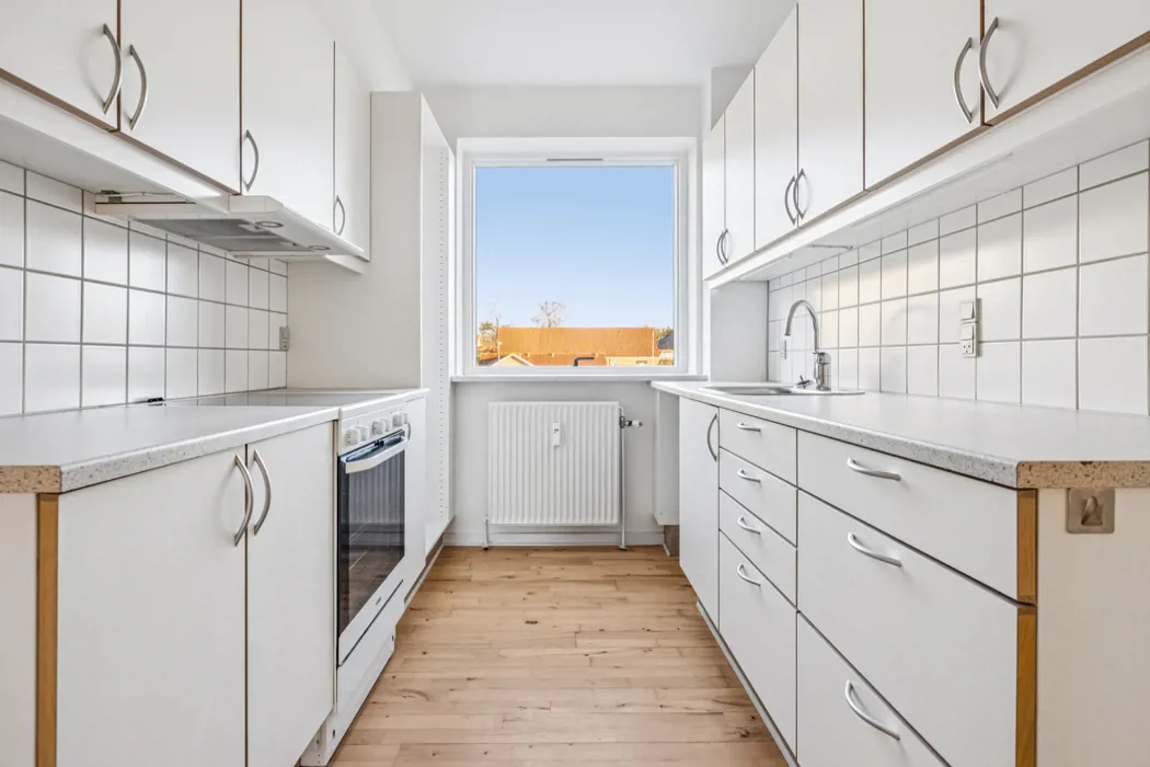 Lys og rummelig lejlighed med god planløsning 3