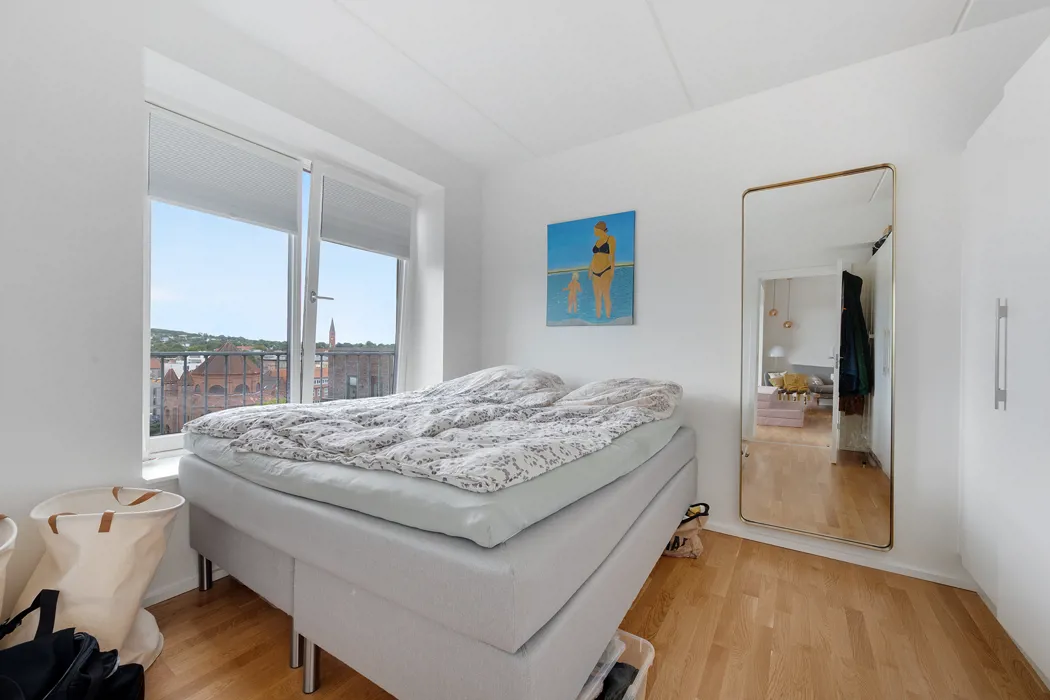 Skøn 4-værelses lejlighed med altan i AstaHus 7