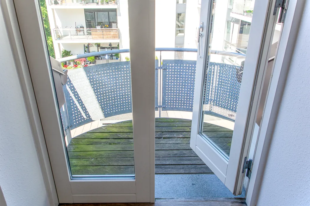 Charmerende 3-værelses lejlighed med synlige bjælker og altan i Herning midtby 3