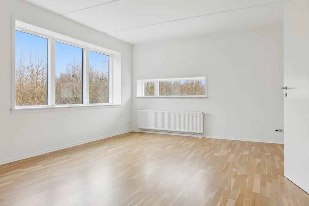 Hyggelig 3-plans lejlighed med moderne faciliteter og tagterrasse 7