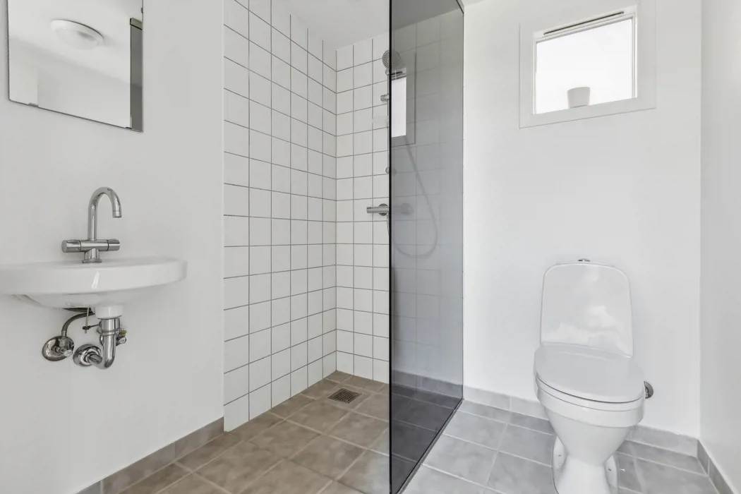 Hyggelig 3-plans lejlighed med moderne faciliteter og tagterrasse 11