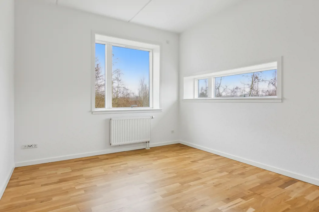 Hyggelig 3-plans lejlighed med moderne faciliteter og tagterrasse 10