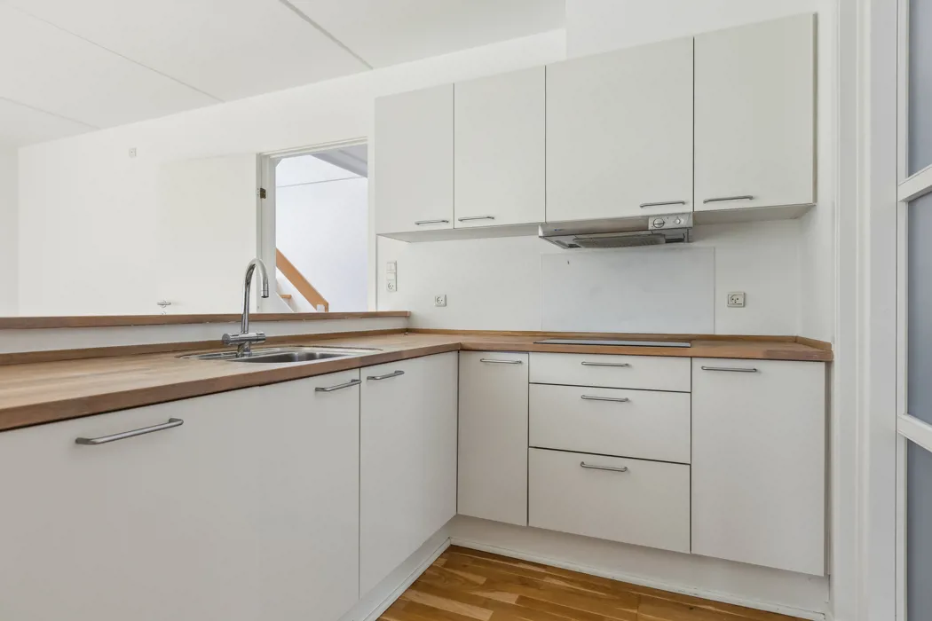 Hyggelig 3-plans lejlighed med moderne faciliteter og tagterrasse 5