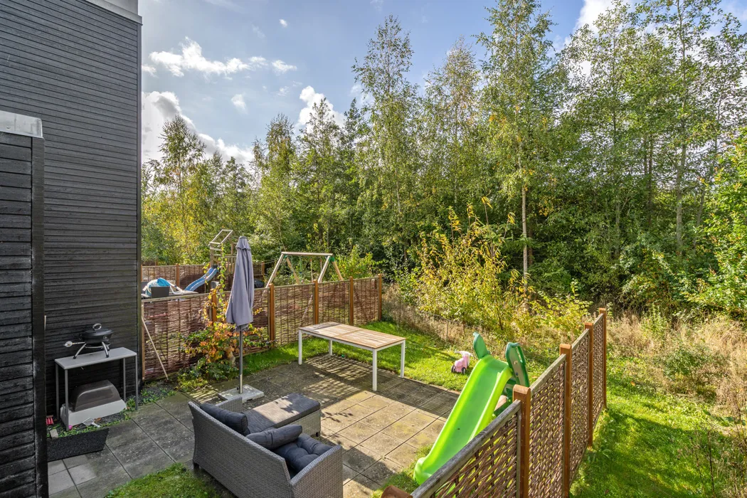 Hyggelig 3-plans lejlighed med moderne faciliteter og tagterrasse 13